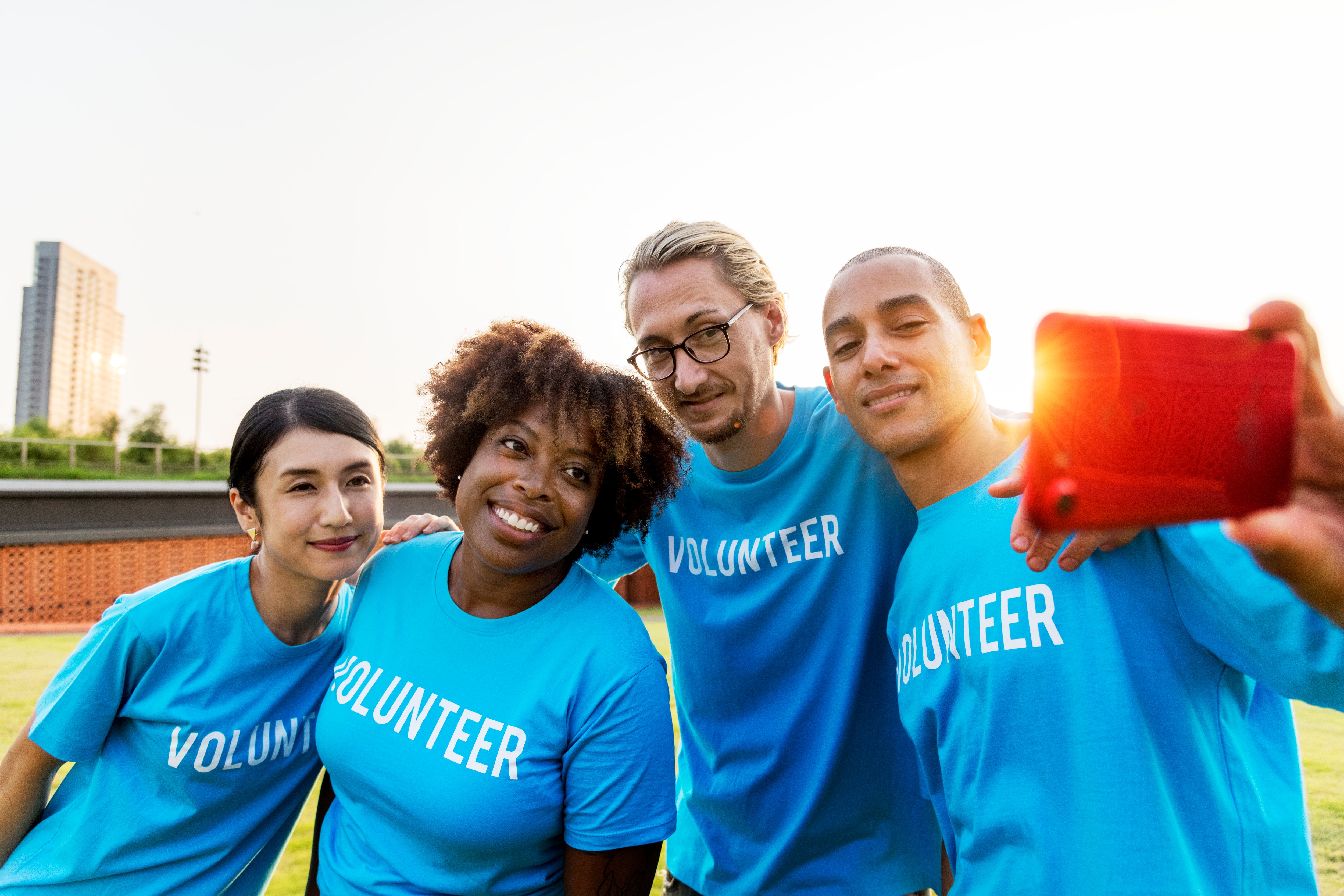 Diverse group of volunteers taking a selfie together